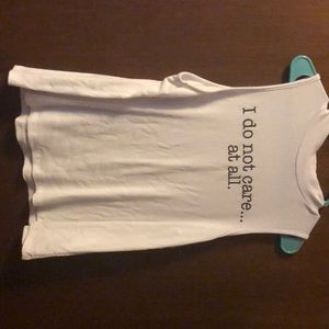 white “i do not care at all” tee